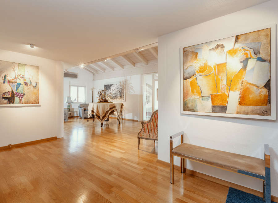 This stunning property boasts a bright and airy interior with beautiful hardwood floors throughout.