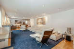 This stunning living room boasts a modern design with a touch of elegance.