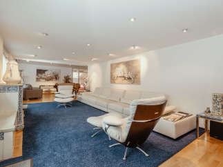 This stunning living room boasts a modern design with a touch of elegance.