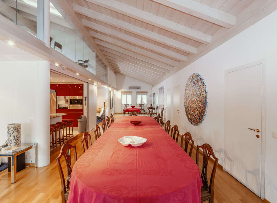 This stunning property boasts a spacious dining area, perfect for hosting gatherings.