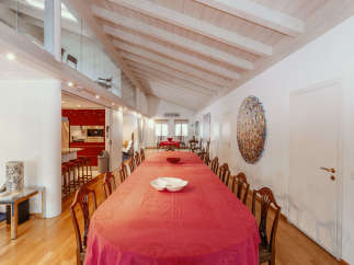 This stunning property boasts a spacious dining area, perfect for hosting gatherings.