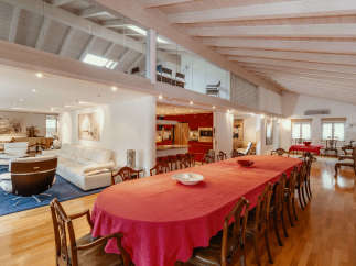 This stunning property boasts a spacious and elegant dining area, perfect for hosting gatherings.