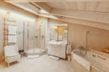 This luxurious bathroom boasts a modern design with a touch of elegance.