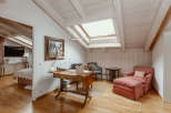 Discover a charming attic space with a unique design.