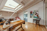 Discover a bright and airy home office with a unique architectural design.