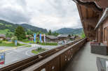 Enjoy breathtaking mountain views from this charming balcony.