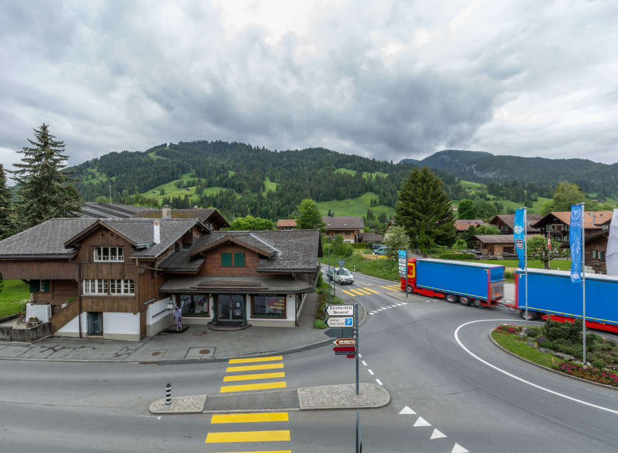 Nestled in a picturesque mountain village, this charming property boasts traditional Swiss architecture.