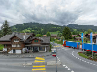 Nestled in a picturesque mountain village, this charming property boasts traditional Swiss architecture.