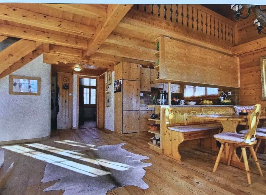 Step into a cozy, rustic haven with this stunning wooden interior.