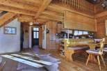 Step into a cozy, rustic haven with this stunning wooden interior.