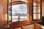 Enjoy breathtaking mountain views from this cozy cabin.