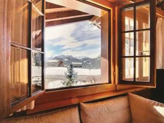 Enjoy breathtaking mountain views from this cozy cabin.