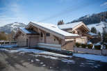 This stunning property showcases a beautiful chalet-style design, perfect for a winter getaway.