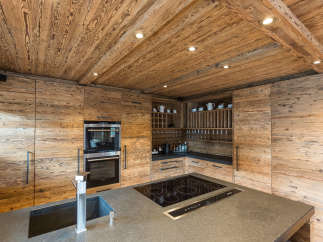 Experience rustic elegance in this stunning kitchen.