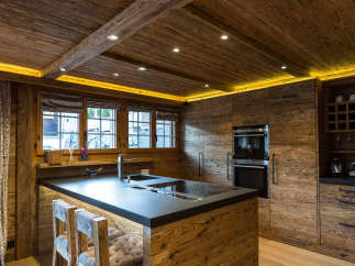 Experience rustic elegance in this stunning kitchen.