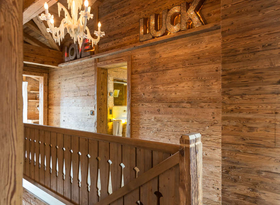 Experience rustic elegance in this stunning property, showcasing exquisite wooden architecture.