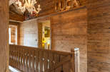 Experience rustic elegance in this stunning property, showcasing exquisite wooden architecture.