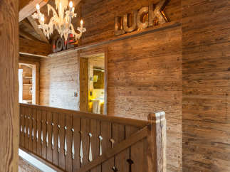 Experience rustic elegance in this stunning property, showcasing exquisite wooden architecture.