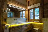 Experience rustic luxury in this stunning bathroom.