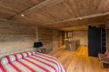 Experience rustic elegance in this stunning bedroom.