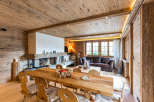 Experience rustic luxury in this stunning chalet, featuring exquisite wooden interiors and a cozy fireplace.