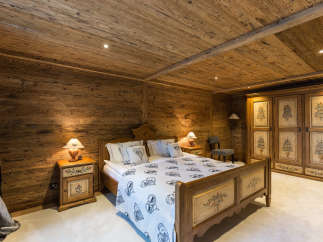 Experience rustic charm in this cozy bedroom.