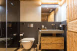 Experience rustic elegance in this stunning bathroom.