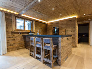 Experience rustic elegance in this stunning kitchen.