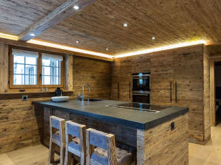 Experience rustic elegance in this stunning kitchen.