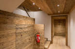 This stunning interior showcases a harmonious blend of natural wood elements, creating a warm and inviting atmosphere.