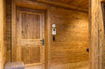 This stunning property showcases exquisite wooden details throughout, creating a warm and inviting atmosphere.