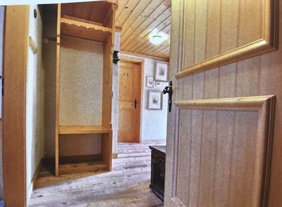 Step into a charming space with rustic wooden floors and a warm, inviting atmosphere.