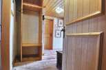 Step into a charming space with rustic wooden floors and a warm, inviting atmosphere.