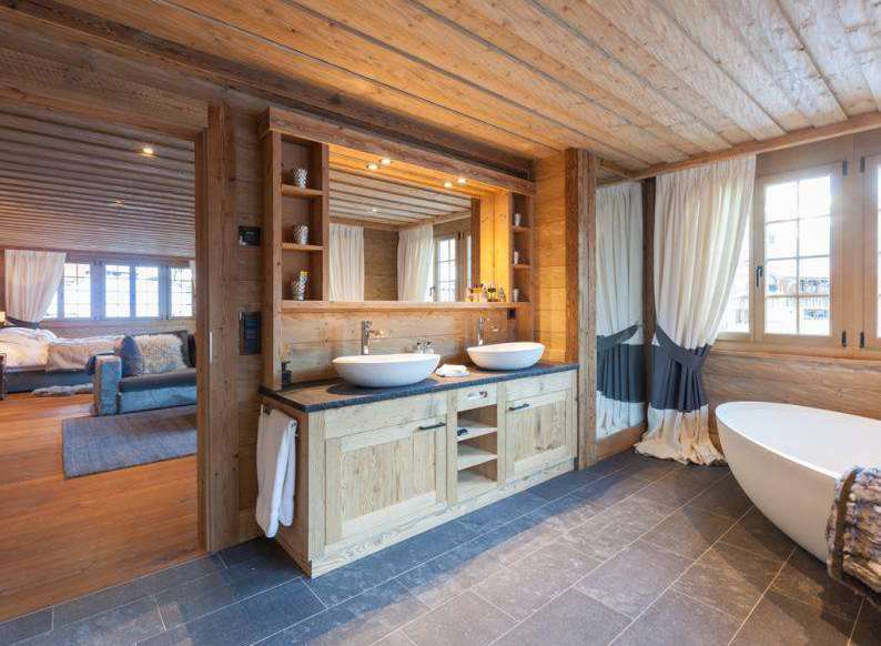 Experience rustic luxury in this stunning bathroom.