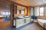 Experience rustic luxury in this stunning bathroom.