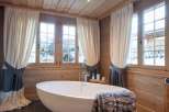 Indulge in the ultimate relaxation in this luxurious bathroom.