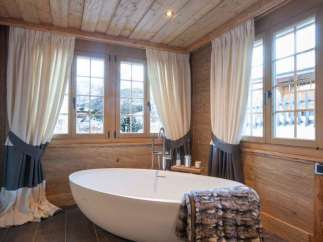 Indulge in the ultimate relaxation in this luxurious bathroom.