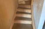 Discover the charm of this property with its inviting staircase.