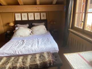 Cozy bedroom with a rustic charm.
