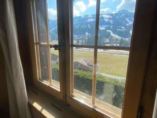 Enjoy breathtaking mountain views from this charming property.