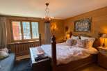 Experience rustic charm in this cozy bedroom.