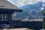 Escape to the serene beauty of this charming chalet nestled in the mountains.