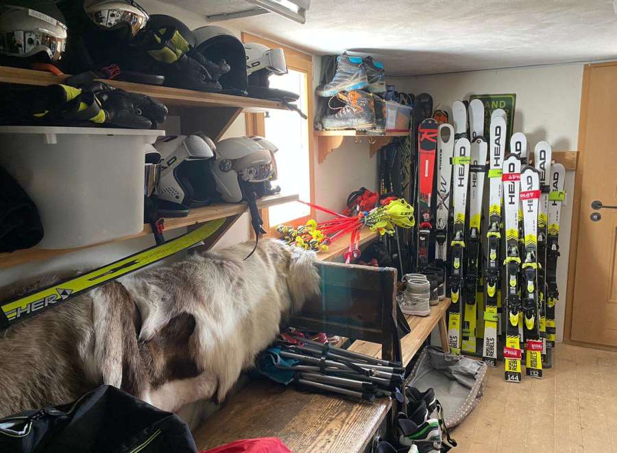 This cozy ski storage area is perfect for storing all your winter gear.