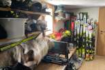 This cozy ski storage area is perfect for storing all your winter gear.