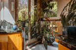 Experience the tranquility of this stunning bathroom, featuring a luxurious bathtub and a serene view of the outdoors.