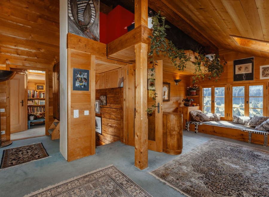 Step into a cozy wooden cabin retreat, where rustic charm meets modern comfort.