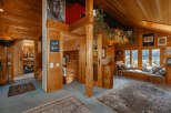 Step into a cozy wooden cabin retreat, where rustic charm meets modern comfort.