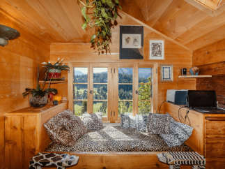 Cozy cabin retreat with stunning mountain views.
