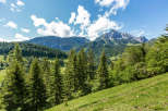Explore the breathtaking beauty of the mountains with this stunning landscape.
