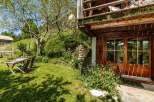 Discover the charm of this rustic cabin nestled in a serene natural setting.